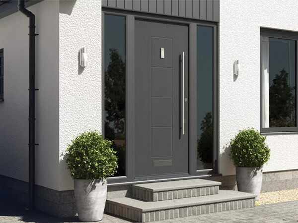 A grey front door with silver handle